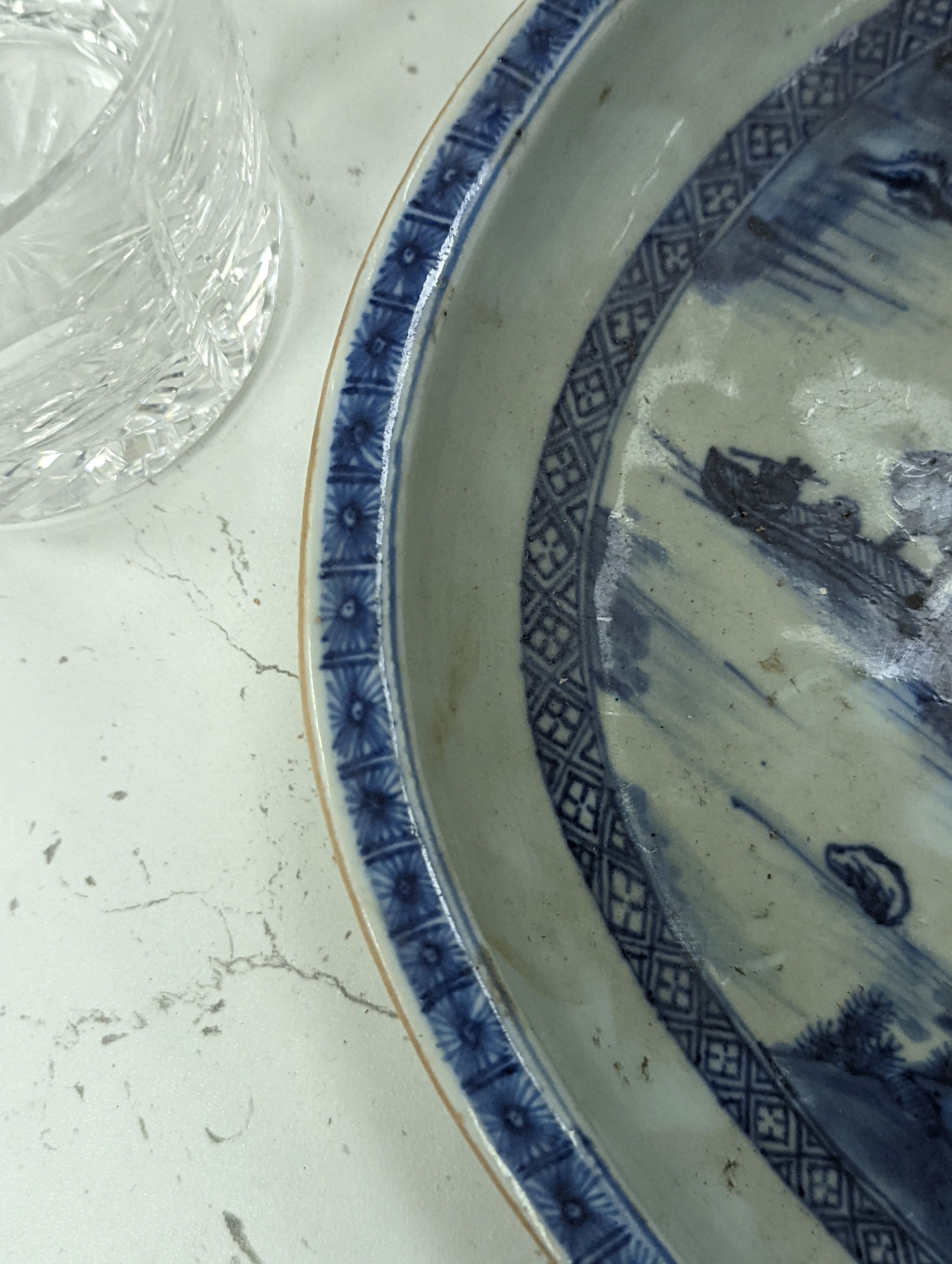 An 18th century Chinese export oval blue and white dish, 32cm.